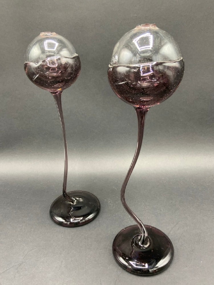 Pair of Heavy Amethyst Art Glass Tall Sculptured Oil Lamps: Pair of Heavy Amethyst Art Glass Tall Sculptured Oil Lamps. Dimensions: 11” x 3 1/4”