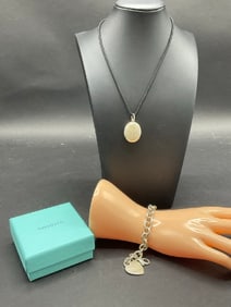 Two (2) Tiffany and Co. Sterling Silver Toggle Bracelet and Locket