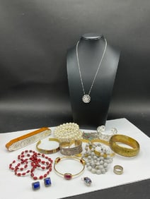 Compiled Costume and Sterling Silver Jewelry Lot