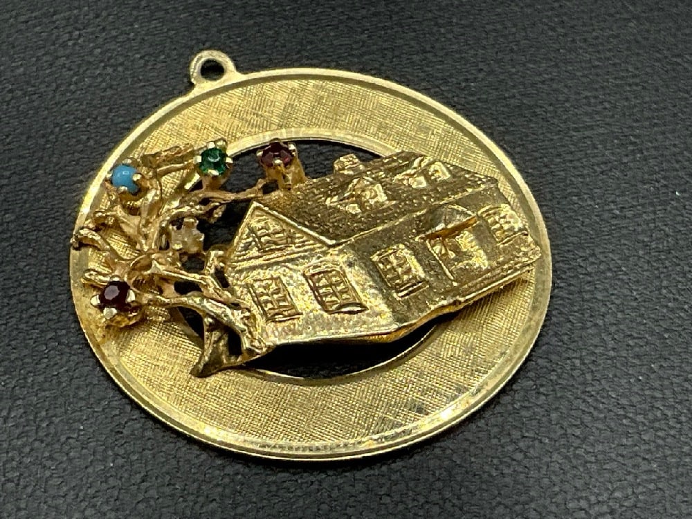 14K Yellow Gold "Home" Charm with Gemstones: 14K Yellow Gold "Home" Charm with Gemstones. Dimensions: 1 1/4"d. Total weight: 5.8 grams