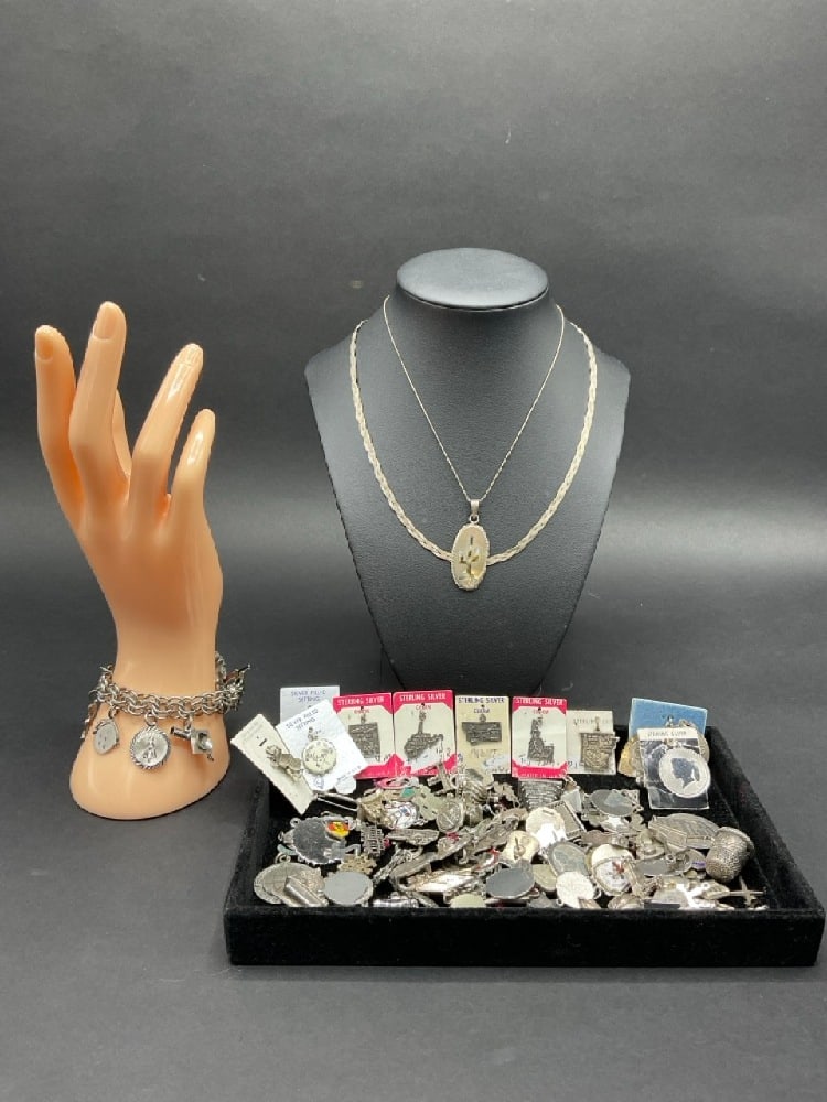 Large Lot Sterling Silver Charms, Necklaces, and Charm Bracelet: Sterling Silver Charms, Necklaces, and Charm Bracelet.Total Weight 345 grams