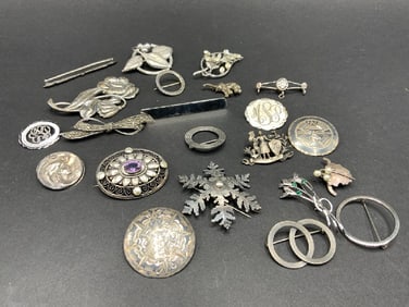 Twenty-One (21) Piece Sterling Silver Brooches and Pins