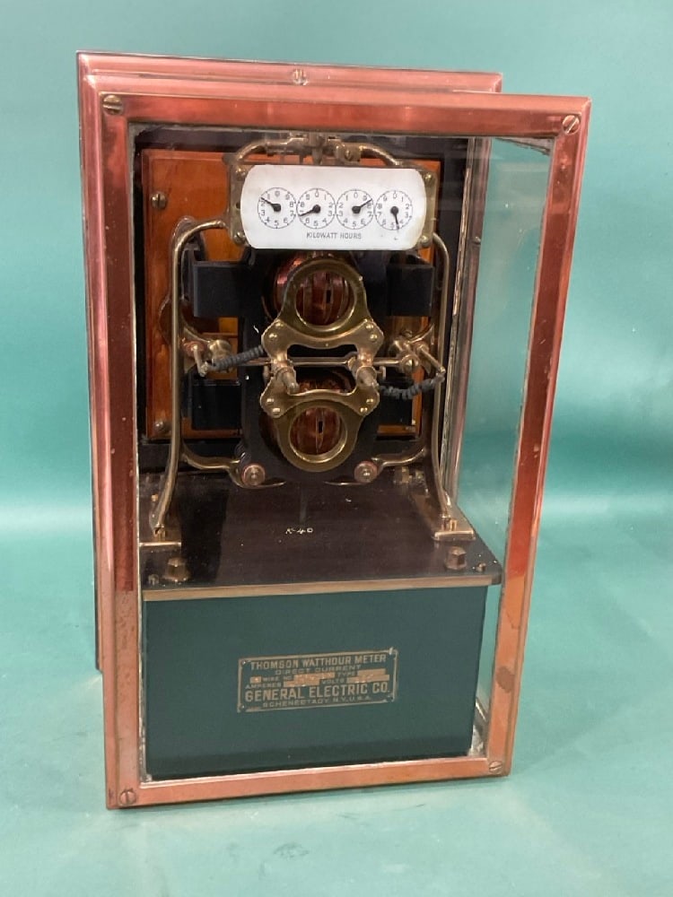 RARE Thomson Watthour Meter in Bronze and Glass Case circa 1907: Thomson Watthour Meter in Bronze and Glass Case circa 1907. Excellent patina. Dimensions: 18 1/2” x 11 1/2” x 8 1/2” (12” with threaded posts) Weight 75lbs.