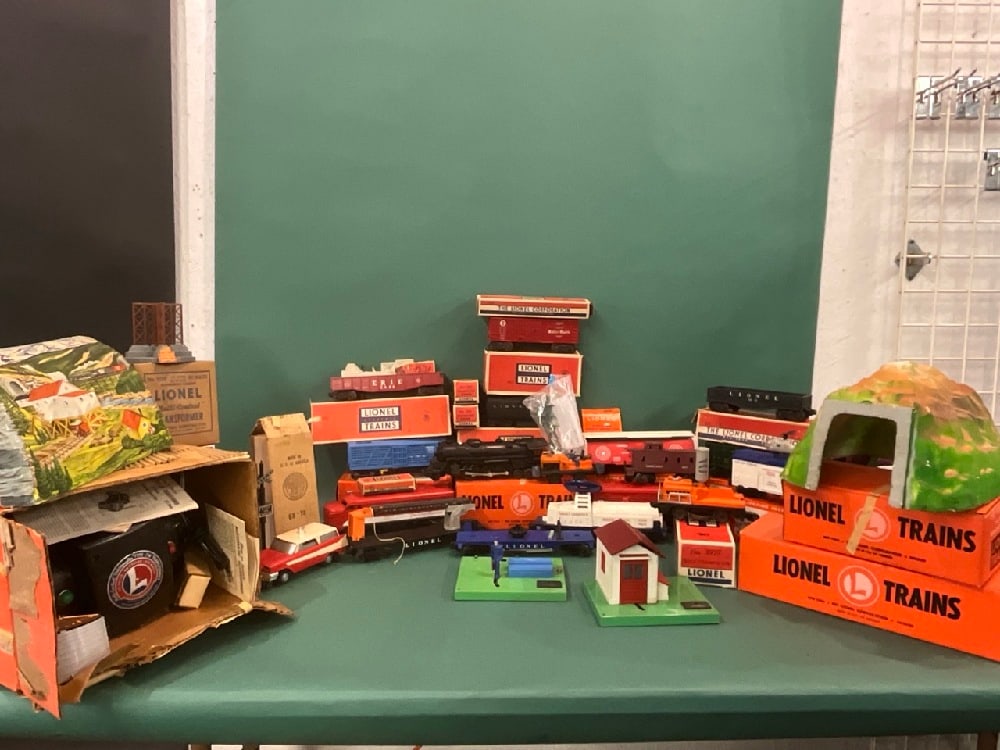 Compiled Group of Vintage Lionel Trains: A compiled grouping of vintage Lionel trains and accessories. As seen in photograph preview.