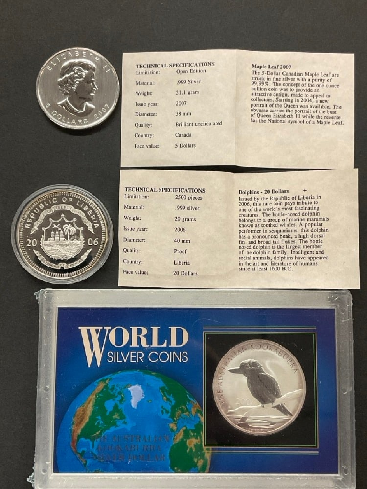 Lot Of 3 .999 Silver Coins: Lot Of 3 .999 Silver Coins.Republic of Liberia, Canada and Kookaburra.