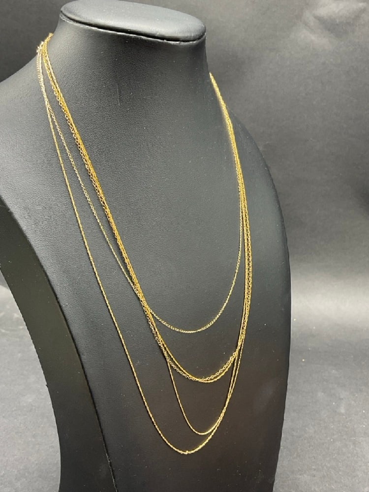 Six (6) 14K and 10K Yellow Gold Dainty Necklaces: Six (6) 14K and 10K Yellow Gold Dainty Necklaces. Five being 14K and one is 10K. Total weight: 3 grams.