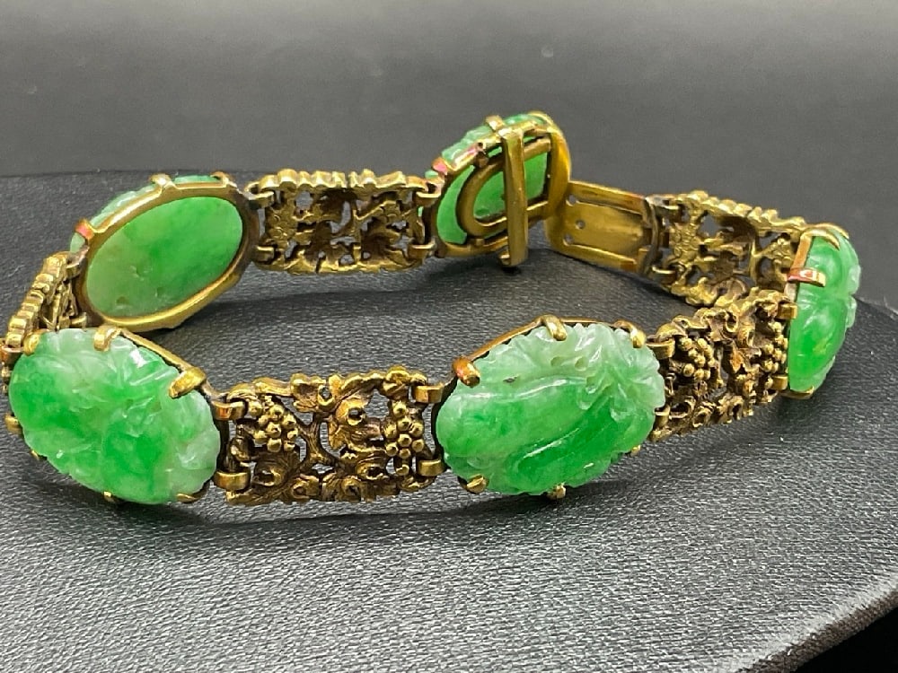 Vintage Tiffany and Co. 18K Yellow Gold Carved Chinese Jade Bracelet: Vintage Tiffany and Co. 18K Yellow Gold Carved Chinese Jade Bracelet. Dimensions: 7” x 5/8”Total weight: 29.5 grams.