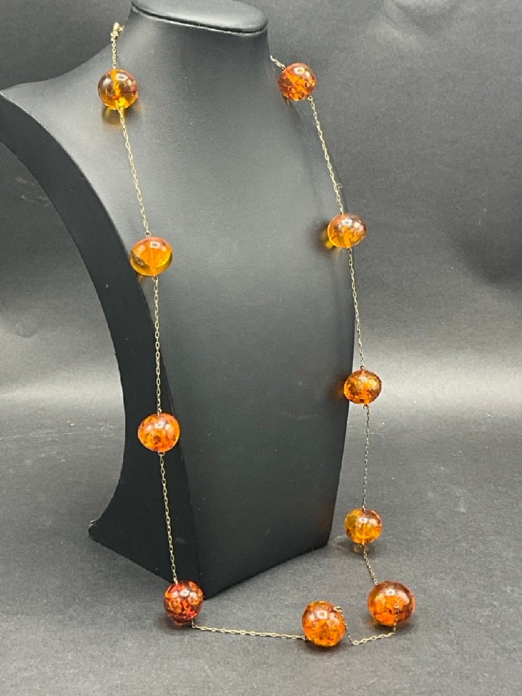 Antique Russian Silver Amber Ball Necklace: Antique Russian Silver Amber Ball Necklace.Dimensions: 34” length. and 3/4” d amber.