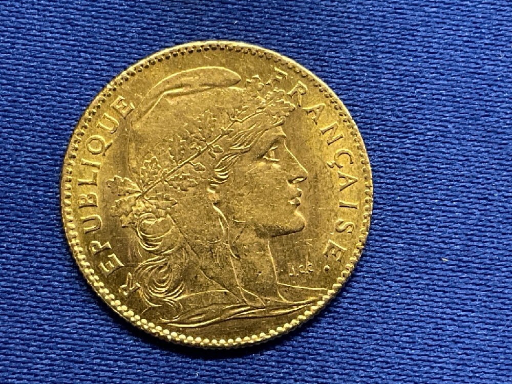 1910 French Gold 10 Francs Coin: 1910 French Gold 10 Francs Coin. 3.2 grams 90% pure gold.