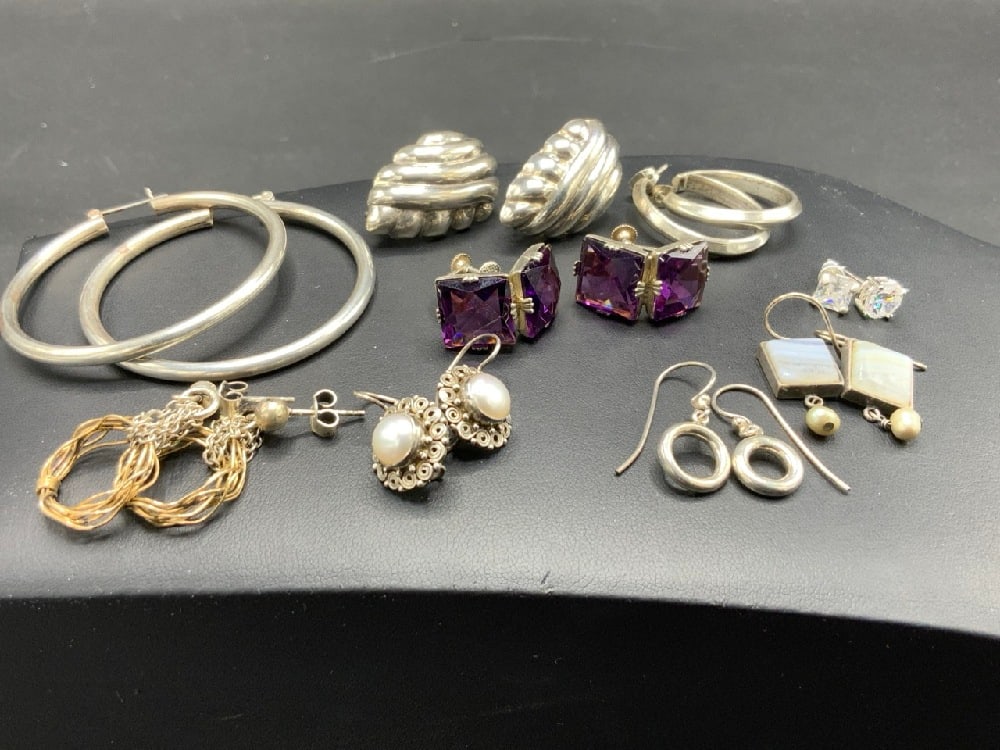 Sterling Silver Pierced and Clip Earrings: Sterling Silver Pierced and Clip Earrings.Total Weight 52.9 g Nine(9) Pairs