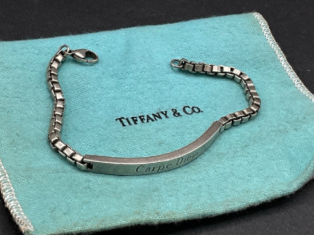 c. 2004 Tiffany and Co. Sterling Silver Venetian Bracelet "Carpe Diem": c. 2004 Tiffany and Co. Sterling Silver Venetian Bracelet "Carpe Diem". A Venetian/Box Link style chain ID bracelet. Engraved "Carpe Diem" (Seize the Day). Dimensions: 8”Total weight: 20.7