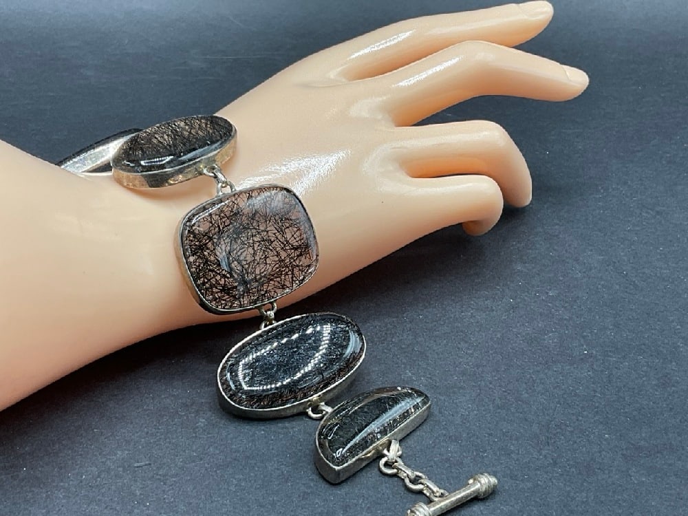 Navajo Indian Bessie Jake Sterling Silver and Quartz Toggle Bracelet: Navajo Indian Bessie Jake Sterling Silver and Quartz Toggle Bracelet.Signed BJ 925.Dimensions: 1 1/2” w 9” LTotal weight: 65.3 grams.