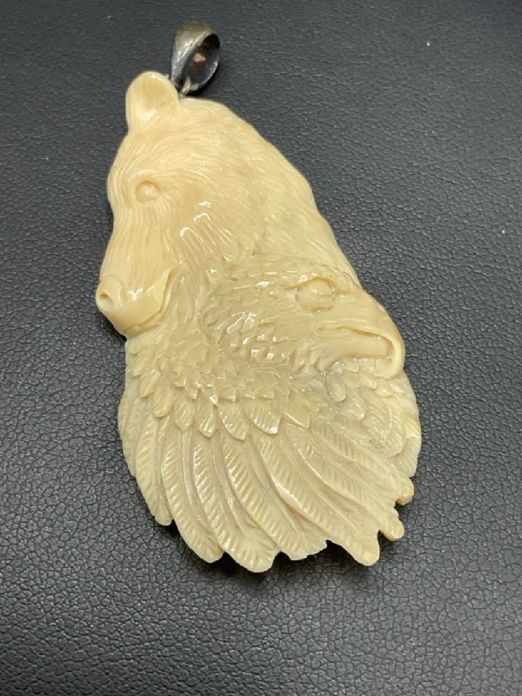 Carved American Indian Bone Eagle Pendant w/ Sterling Silver Bail: Carved American Indian Bone Eagle Pendant w/ Sterling Silver Bail.Total weight: 6.5 gDimensions: 2 1/2” x 1 1/8”;