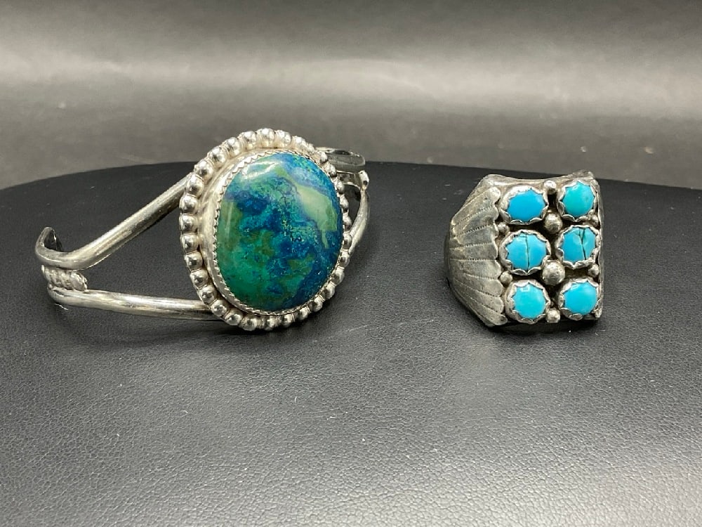 Sterling Turquoise Indian Ring and Bracelet: Sterling Turquoise Indian Ring and Bracelet. Please note cracks to turquoise stone in ring. Bracelet excellent. Please see photograph preview. Both vintage pieces. Total weight: 47.1 grams.