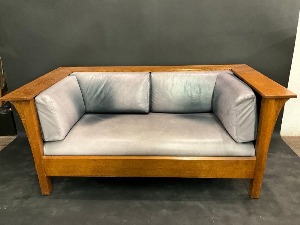 Stickley Art's and Crafts Settle or Sofa: Stickley Art's and Crafts Settle or Sofa wit leather covered upholstery. Signed at base. Late 20th century. Dimensions: 67 1/4” x 37 1/2” x 29” h .
