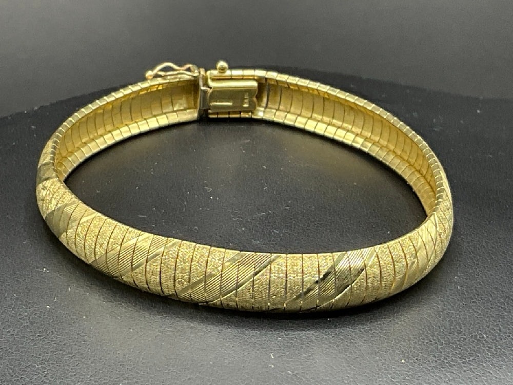 14K Yellow Gold Milor Italian Bracelet: 14K Yellow Gold Milor Italian Bracelet, Herringbone style.Dimensions: 8 1/4” x 3/8”Total weight: 21.3 grams.
