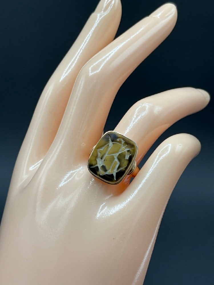 Antique 10K Yellow Gold Carved Cats Eye Insignia Ring: Antique Carved Cats Eye Insignia Ring. Stamped "X" for 10K gold. 19th century. Total weight: 5.5 grams. Size 8.