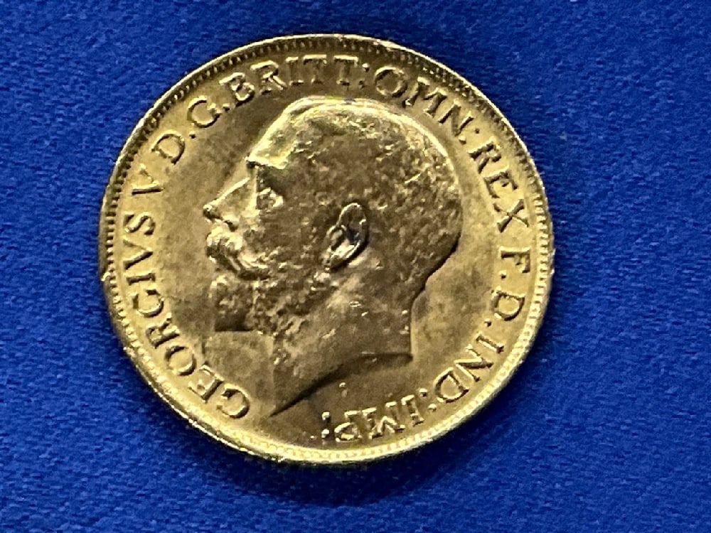 1912 British Sovereign Gold Coin: 1912 British Sovereign Total weight: 9.2 grams. Coin Purity .917. Coin Weight: 7.98 grams.