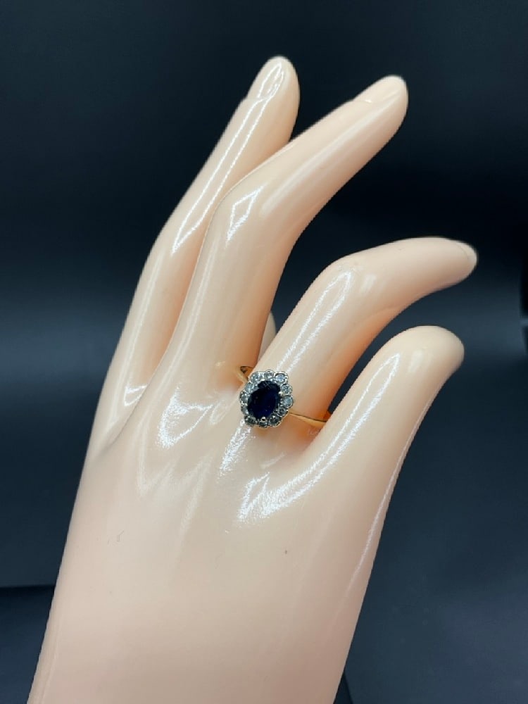 14K Yellow Gold Blue Sapphire and Diamond Ring: 14K Yellow Gold Blue Sapphire and Diamond Ring.Size 8.Total weight: 2.4 grams.