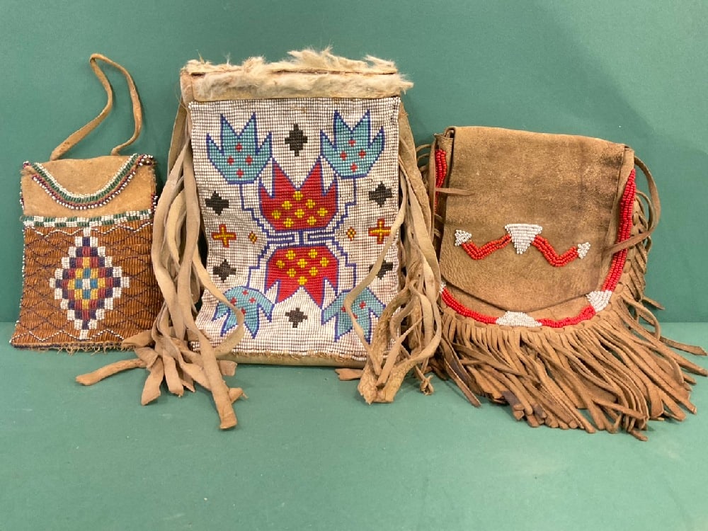 (3) Native American Beaded Leather Tobacco Bags: (3) Native American Beaded Leather Tobacco Bags.Dimensions: Lg - 28” x 6” Sm - 5 3/4” x 4 1/2”