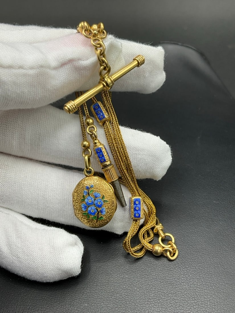 16 1/2?? Enameled 14K Yellow Gold Antique Watch Fob Chain: Antique 14K Yellow Gold Enameled Watch Fob Chain. Dimensions: 16 1/2" Comes with pencil, locket and watch key. Enameled morning glory flowers. Total weight: 17.1 grams.