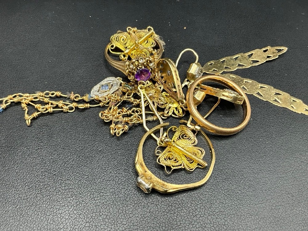 Compiled 10K Yellow Gold Jewelry Group: Compiled 10K Yellow Gold Jewelry Grouping. Wedding band, ring, damaged items for repair etc. Please see photograph preview. Total weight: 18.6 grams.