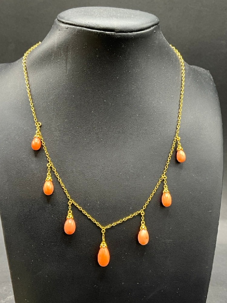 14K Pink Coral Tear Drop Necklace: 14K Pink Coral Tear Drop Necklace.Dimensions: 16” length.Total weight: 7.1 grams.