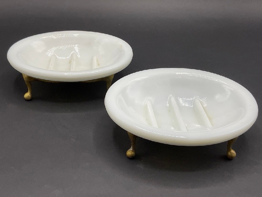 A Pair of Antique Milk Glass and Brass Soap Dishes: A Pair of Antique Milk Glass and Brass Soap Dishes. Late 19th or early 20th century.Good Condition, Please See Preview Photographs Dimensions: 6” L x 5” W x 2”H DishesProvenance: