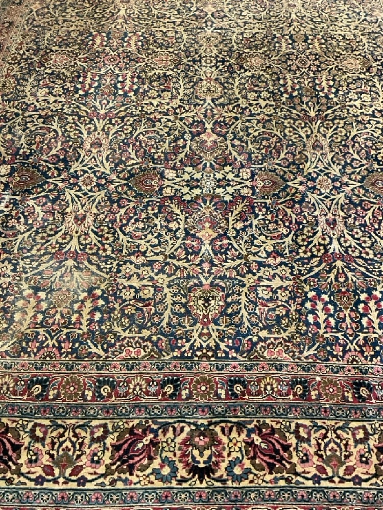 13ft X 9ft Persian Wool Oriental Carpet: A 13ft X 9ft Persian Wool Carpet. Tree of life pattern with multiple borders. Base is an organic green with rose colors. Dimensions: 13ft X 9ft 9" Provenance: YMCA Frost Valley Castle Claryville, New