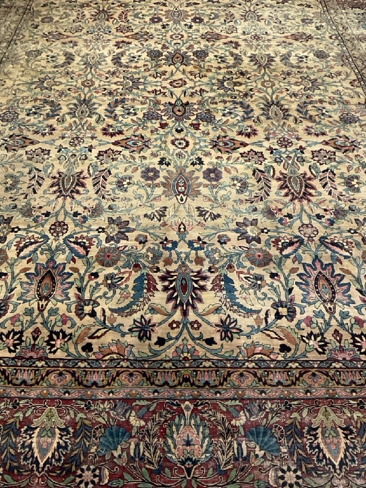 14ft X 9ft Persian Kashan Carpet: A 14ft X 9ft Persian Kashan Carpet. 1st half of 20th century. Water staining and wear noted. Please see photograph preview. Poor condition. Dimensions: 14 ft 6” X 9ft 10” Provenance: YMCA