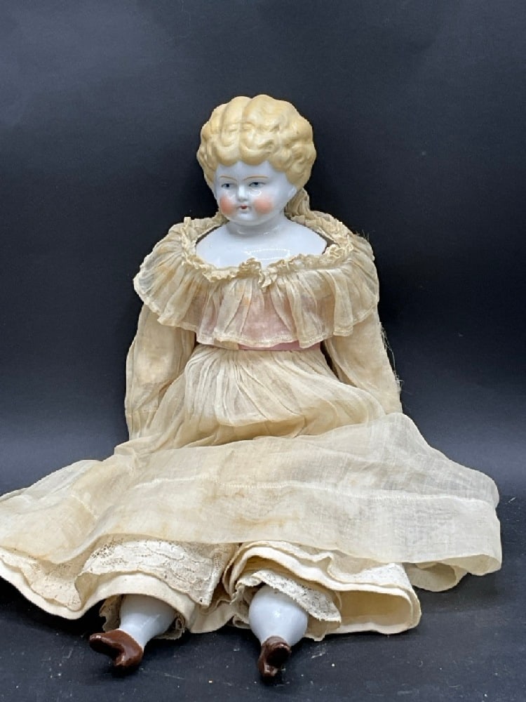 Antique Blond 18" China Head Doll: Antique Blond 18" China Head Doll.Dimensions: 18” height.