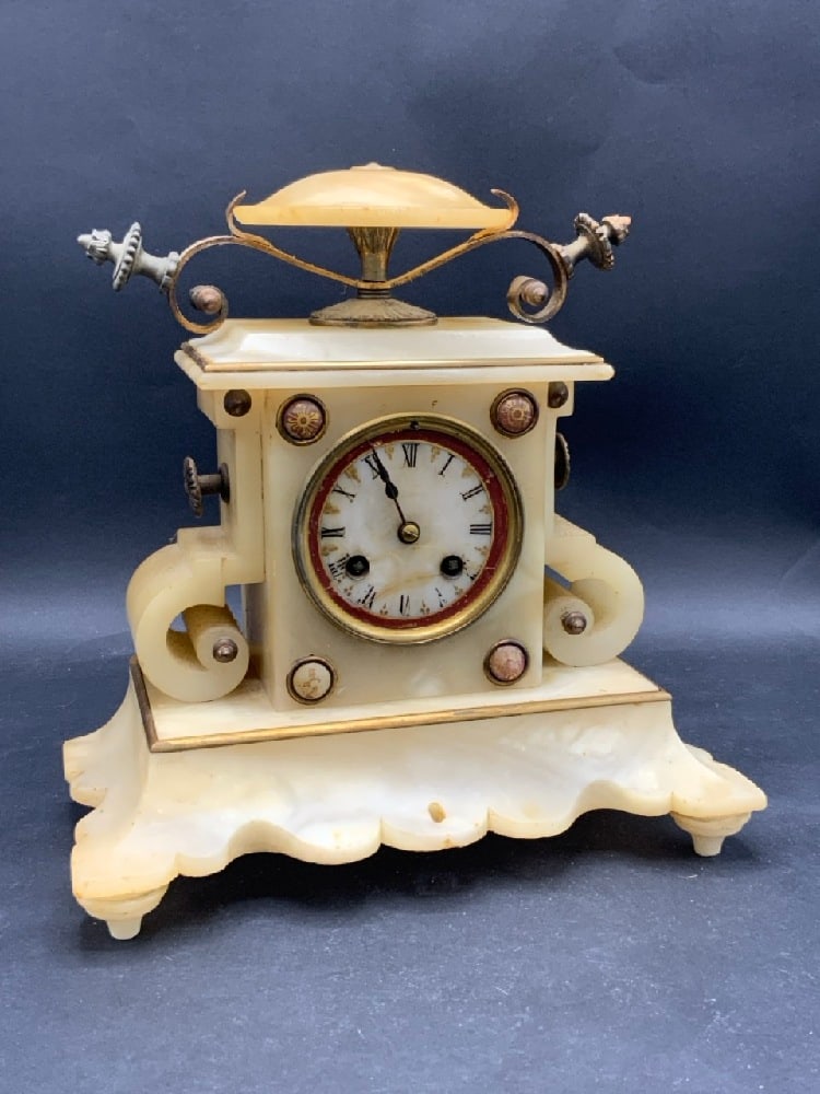 19th Century French Alabaster Clock: S. Marti 19th Century French Alabaster and Bronze Clock. Edge chipping to case noted. Not tested. Pendulum present. Cleaning and service needed. Please see photograph preview. Dimensions: 11" X 10" X