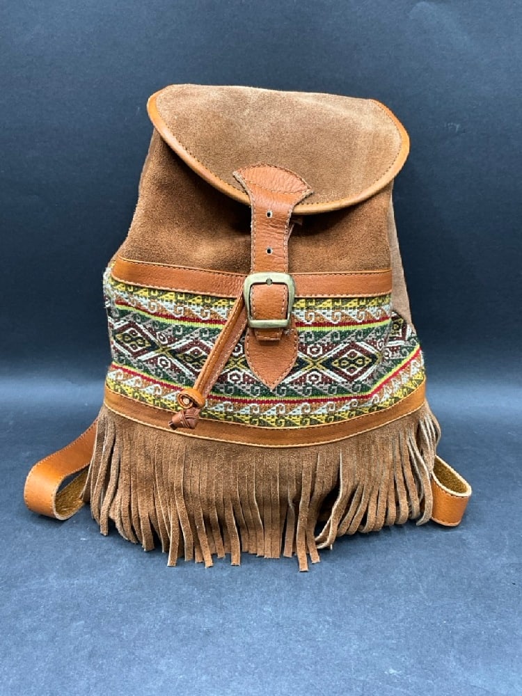 Brown Suede Artisan Cinch Buckle Western Style Backpack: Brown Suede Artisan Cinch Buckle Western Style Backpack.Dimensions: 13” x 11”
