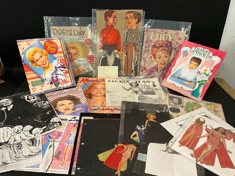 Large Lot of Vintage Paper Dolls - Doris Day, Lucy, Joan Crawford and Gloria Jean etc.. As seen in: Large Lot of Vintage Paper Dolls - Doris Day, Lucy, Joan Crawford and Gloria Jean etc.. As seen in photograph preview. Unknown if all complete.