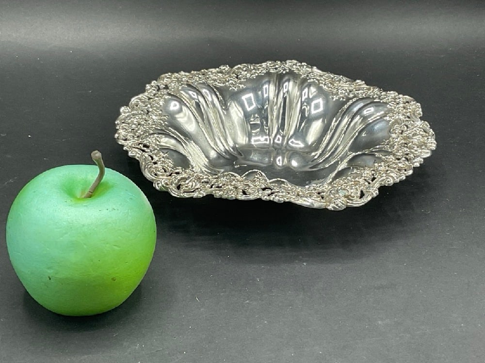 Sterling Silver Repousse Serving Bowl: Sterling Silver Repousse Serving Bowl. Early 20th century. Dimensions: 7 3/4” Total weight: 185 grams or5.94 Troy oz.