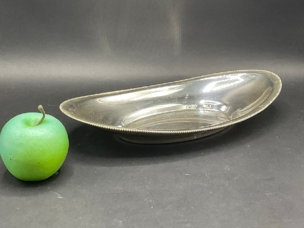 Sterling Silver Oval Form Serving Bowl: Sterling Silver Oval Form Serving Bowl.Dimensions: 12 3/4” x 6 3/4” Total weight: 290 grams or9.32 Troy oz. .