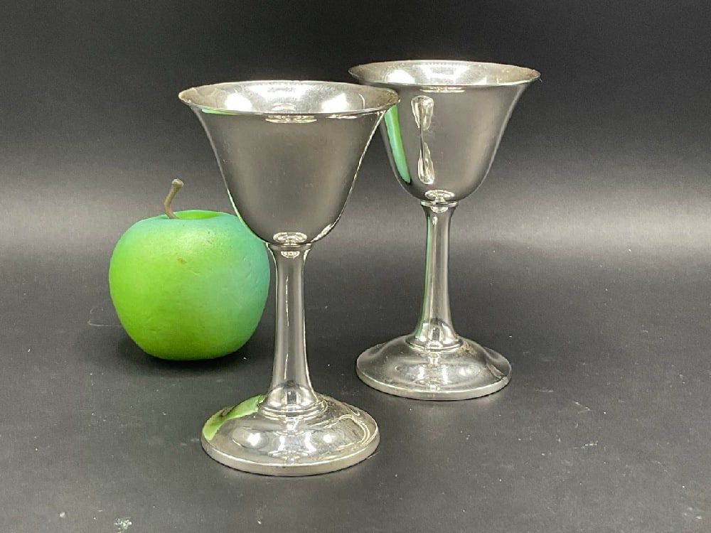 A Pair, Sterling Silver Goblets: A Pair, Sterling Silver Goblets.Dimensions: 5 1/8” Total weightL 231 grams or 7.42 Troy ounces.