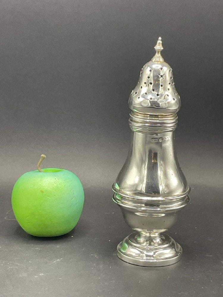 English Birmingham Sterling Silver Muffineer or Sugar Shaker: English Birmingham Sterling Silver Muffineer or Sugar Shaker. Hallmarked for W. H. Kirby "WHK" Birmingham, England. Dimensions: 7 1/2” Total weight:186 Grams or 5.98 Troy ounces. .Birmingham WHK