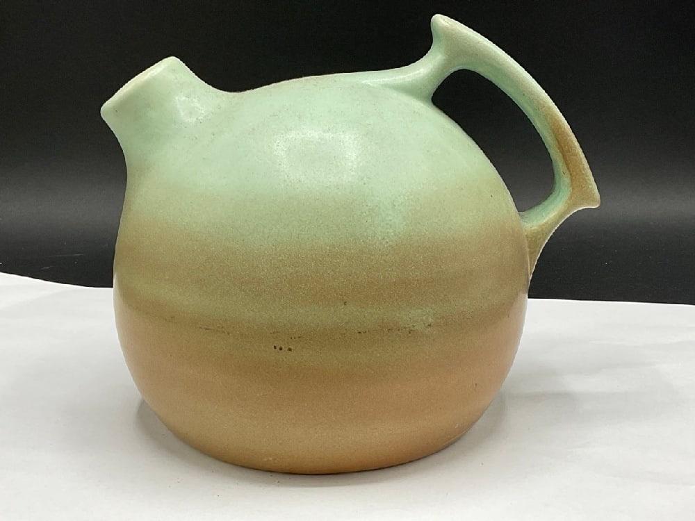 Rum Rill Pottery Jug: Rum Rill Pottery Jug. Signed at base "Rum Rill"Dimensions: 7 1/2” x 8 1/2”