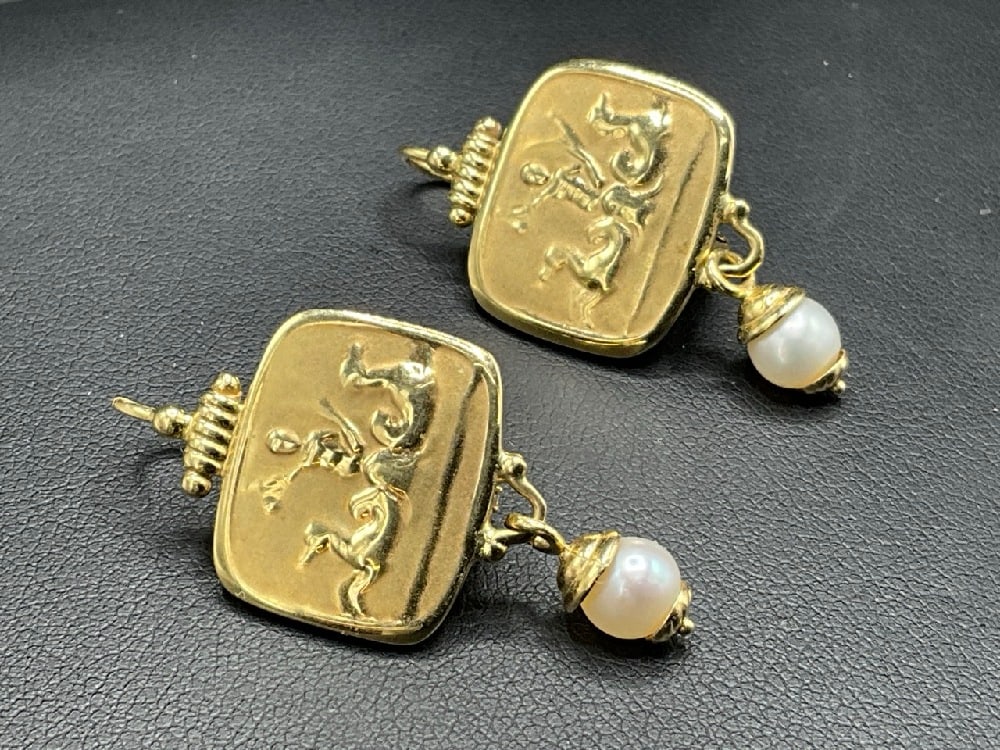14K Yellow Gold Pearl Drop Intaglio Earrings: 14K Yellow Gold Intaglio Style Earrings having a Mythological scene with dangling pearls. Total weight: 7.4 grams. Dimensions: 1 1/2” x 3/4” .