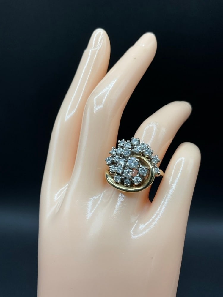 14K Yellow Gold Diamond Cluster Ring: 14K Yellow Gold Diamond Cluster Ring.Size 7.Dimensions: .16 ct. main stone and (21) 2 mm stones.Total weight: 7.9 grams. Jeweler marks ERFV