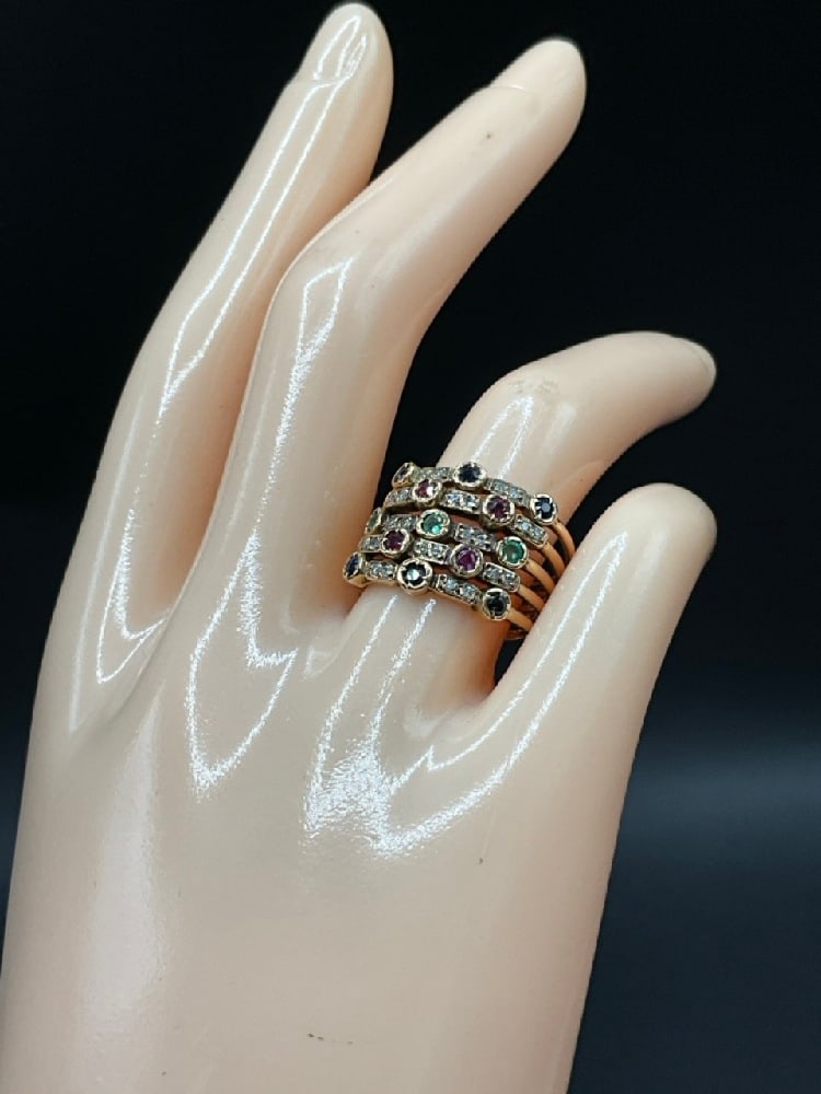 14K Yellow Gold Gemstone 5 Band Stacking Ring: 14K Yellow Gold Gemstone 5 Band Stacking Ring. Fine diamonds, emeralds, rubies and blue sapphire stones. Size 7.Total weight: 7.6 grams.