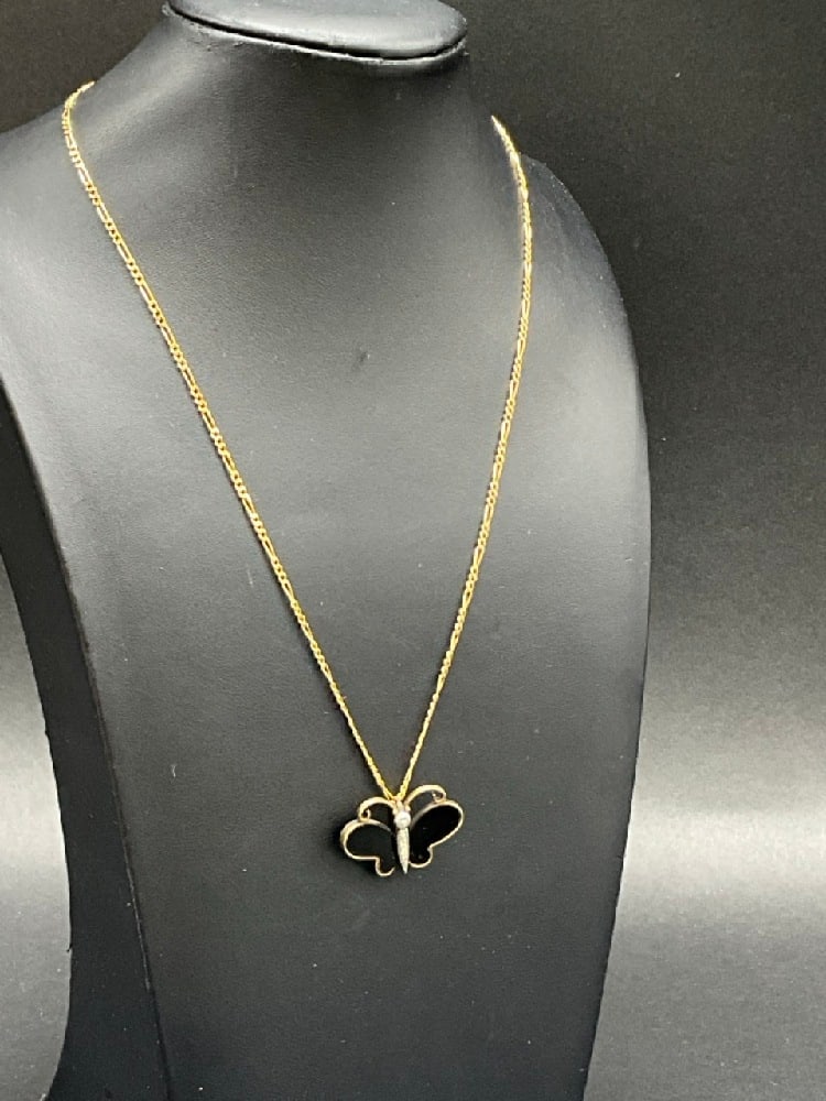 14K Yellow Gold, Onyx and Diamond Pendant Necklace: 14K Yellow Gold, Onyx and Diamond Pendant Necklace. Five (5) diamonds accenting butterfly wings. 18" 14K yellow gold figaro link chain. Total weight: 6.6 grams and 3.2 grams.