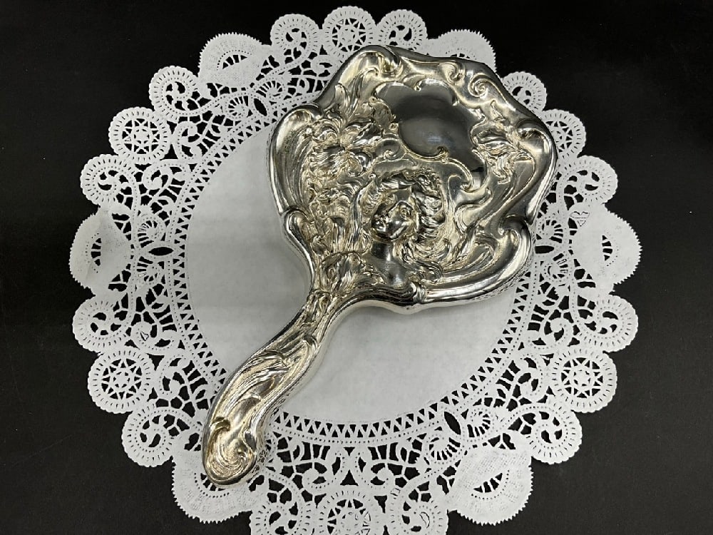 Antique German Silver Art Nouveau Vanity Mirror: Antique German Silver Art Nouveau Vanity Mirror.Dimensions: 6” x 10”