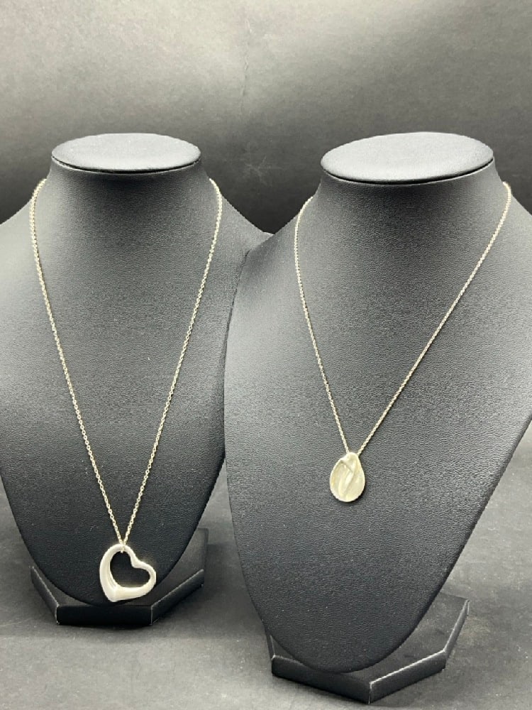 Tiffany & Co Elsa Peretti Heart and Madonna Necklaces: Tiffany & Co Elsa Peretti Heart and Mother and Child Necklaces20” Heart 1” , 16” Madonna 7/8” Total Weight:14.9 grams.
