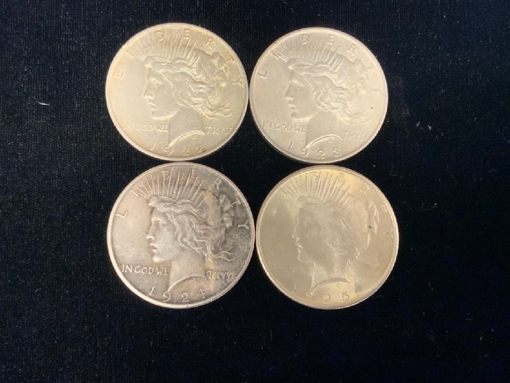 Four (4) U.S. Silver Peace Dollars (1 of 2)