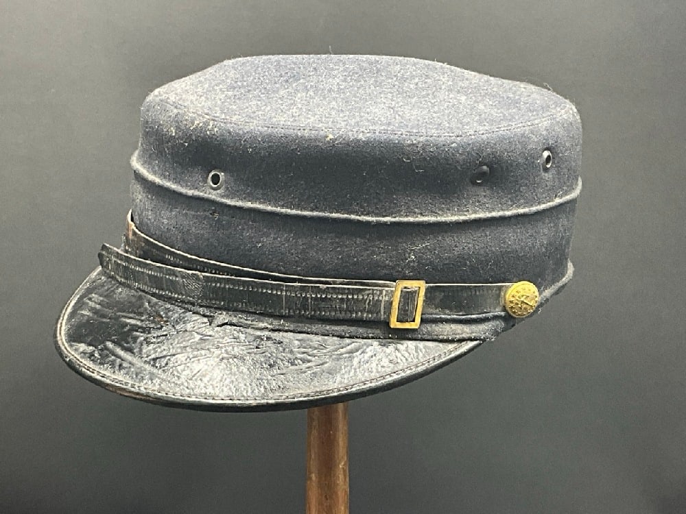 Late 19th Century Naval Military Kepi Hat: Late 19th Century Naval Military Kepi Hat. Made by Ridabock and Company New York. Post Civil War, Probably Indian War era. Wool with leather. Brass buttons with "Hope" and Naval Anchor on Each Side. L