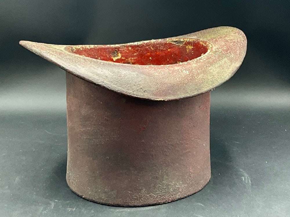 19th Century Red Enamel Painted Cast Iron Top Hat Spittoon: 19th Century Red Enamel Painted Cast Iron Top Hat Spittoon.Dimensions: 7 1/2” x 11” x 7” .