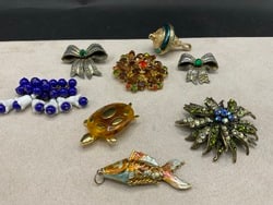 Vintage Costume Pins and Pendants: Vintage Costume Pins and Pendants. Including, Roth-Feder, Swarovski and Cloisonné. As seen in photograph preview.