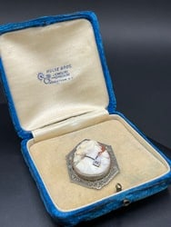 10K White Gold Cameo Brooch Pendant: 10K White Gold Cameo Brooch Pendant. Total weight: 6.6 grams.Dimensions: 1 3/4” x 1 1/4” .